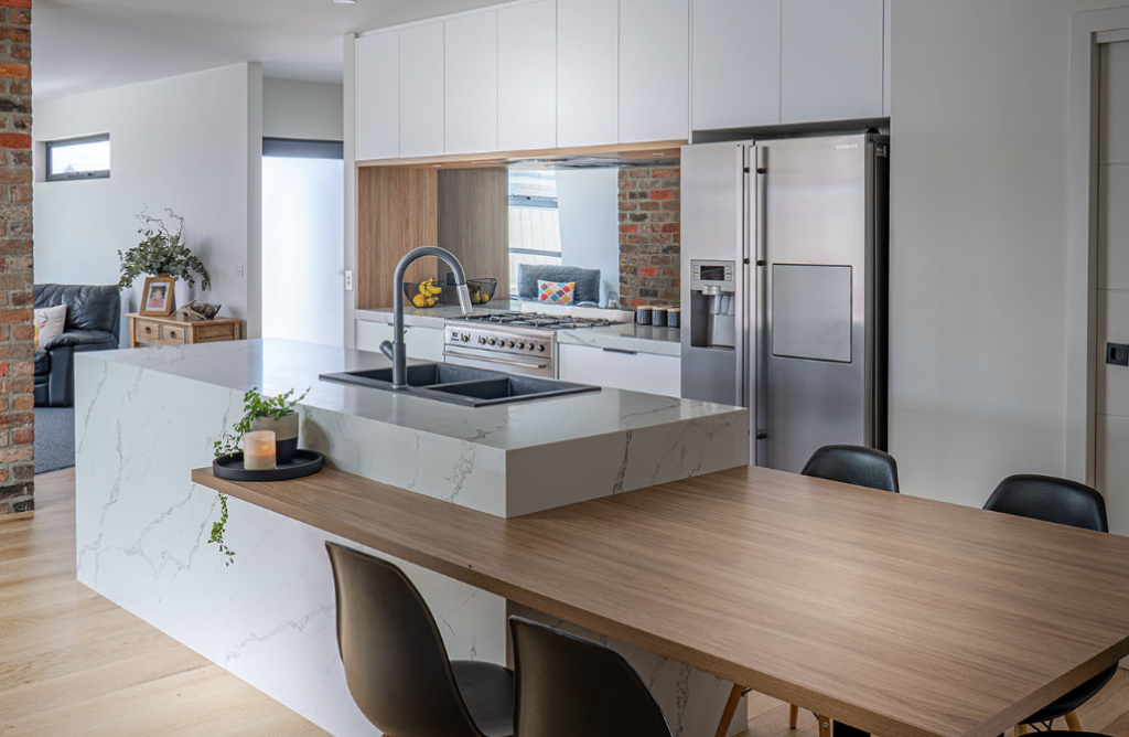 StoneCraft Kitchen & Bath | Dani's Kitchen (Glacier) Welcome to our latest project showcase, where StoneCraft proudly presents the breathtaking transformation of Dani's Kitchen. Through the intricate interplay of our 2023 StoneCollection, we brought a fresh perspective to this space. Our choice of the Glacier Stone served as the focal point, elevating the kitchen's aesthetic with its cool yet sophisticated allure.